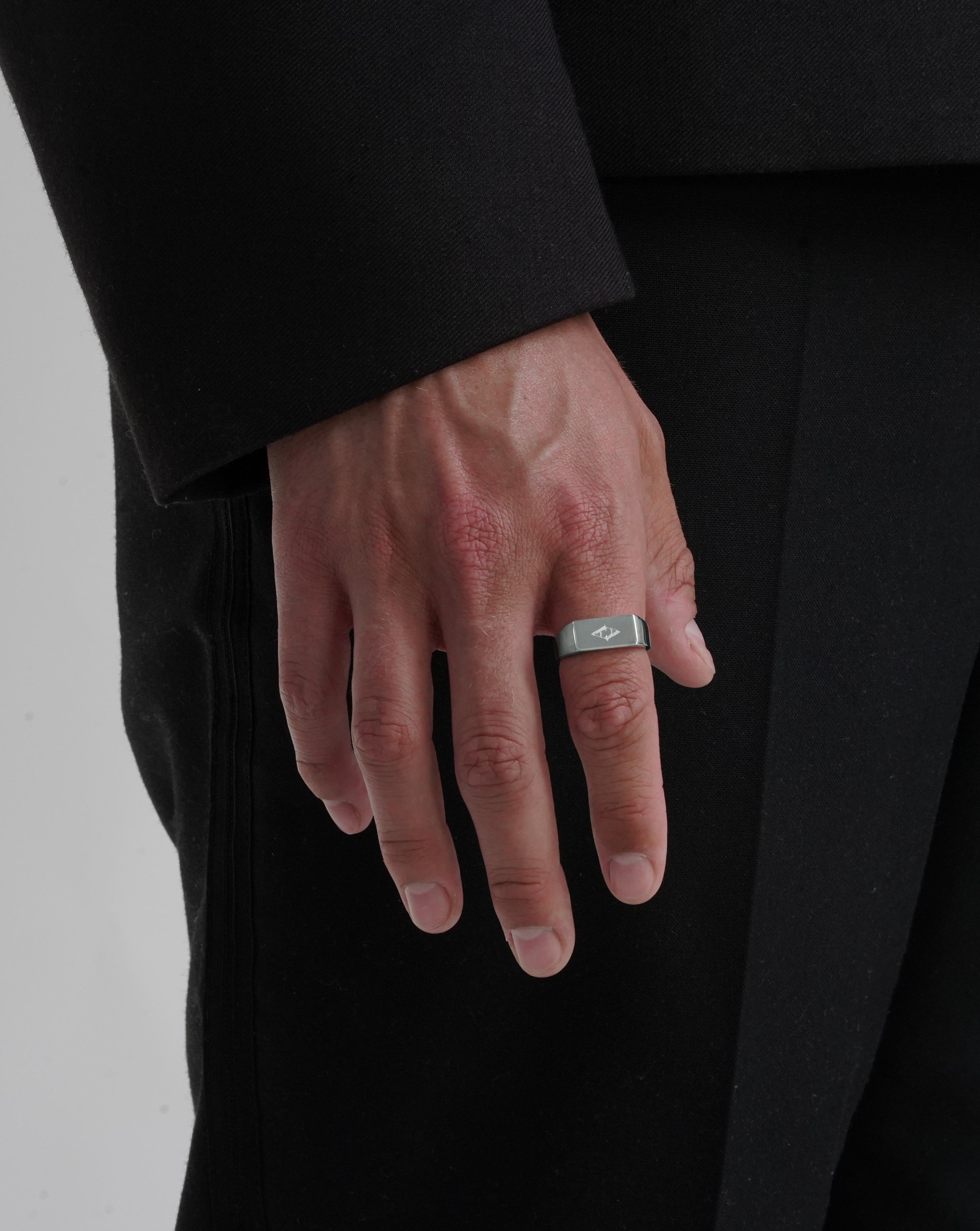 Men's Silver signet ring. Acardi signet ring viewed model from front. Men's jewellery