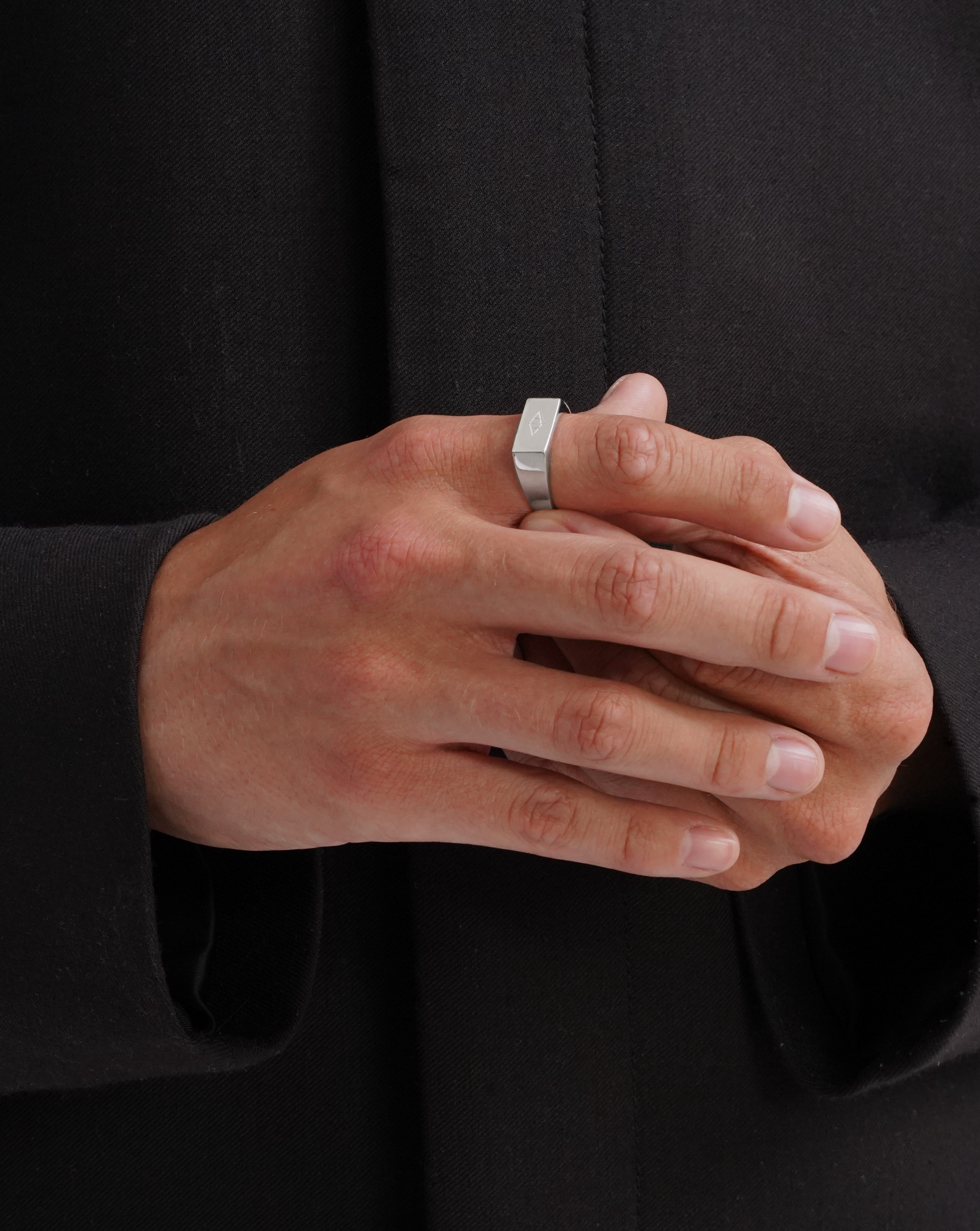 Men's Silver signet ring. Acardi signet ring viewed model from front. Men's jewellery